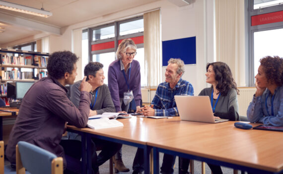 teacher with group of mature adult students in cla 2022 02 02 04 51 18 utc